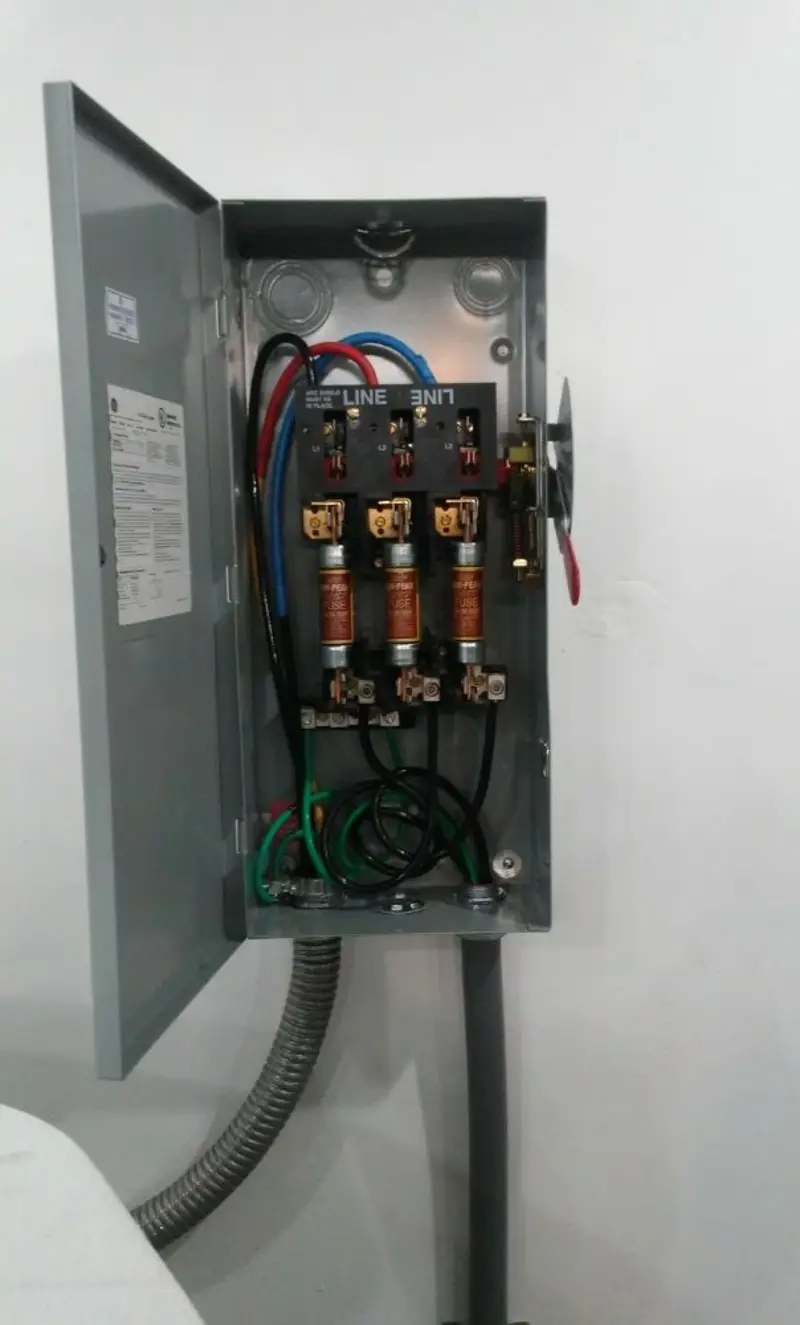 Three-phase disconnect switch installed for Smoke Detector Installation in Caroline